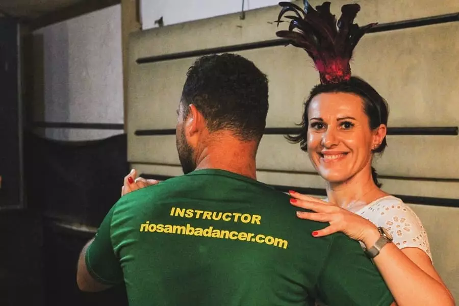 Studant with her samba instructor