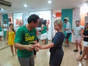 Our samba instructor Helio teaching how hands move on samba