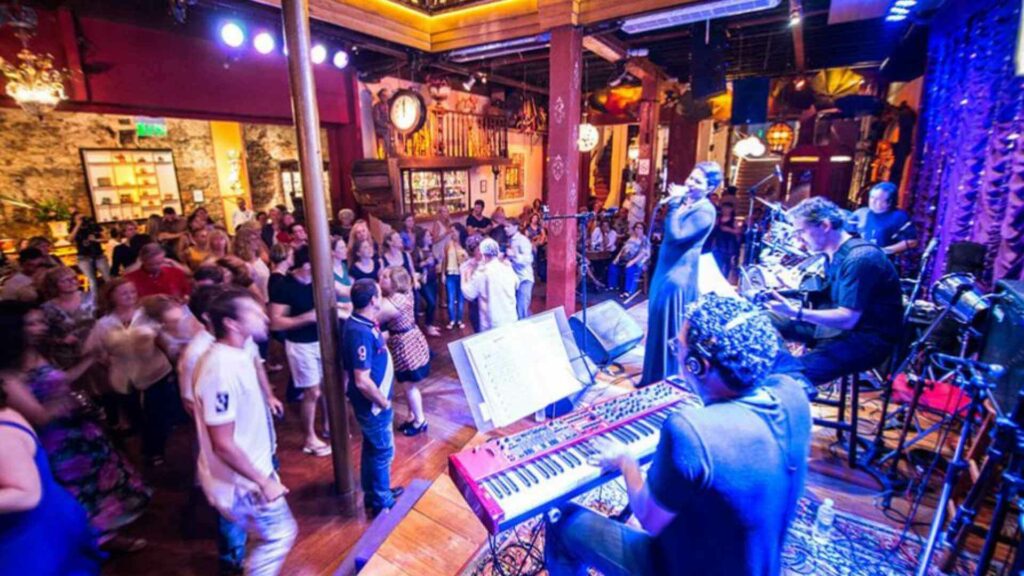 Live samba band performing at a packed samba club in Lapa during the Rio night tour